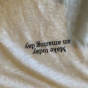 white top with make today an amazing day in black